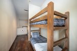 Floor 3 offers twin over twin bunk beds in the common area - a fun space for our younger guests